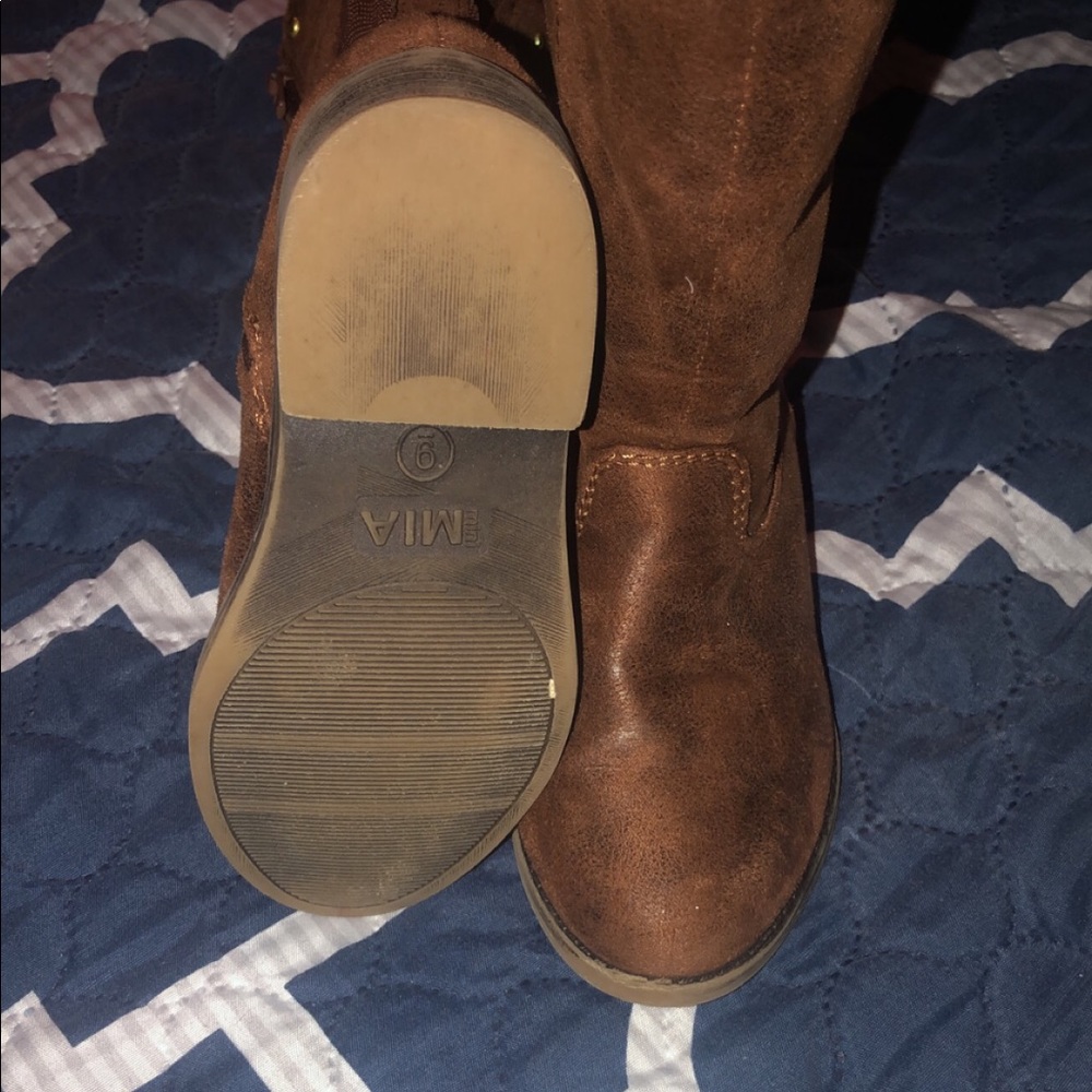 Brown boots with gold studs